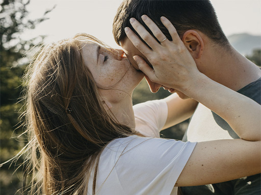 Happy couple kissing, represents how both couples and individuals can find support through counseling at Ammirati Counseling Group, in Deerfield, IL