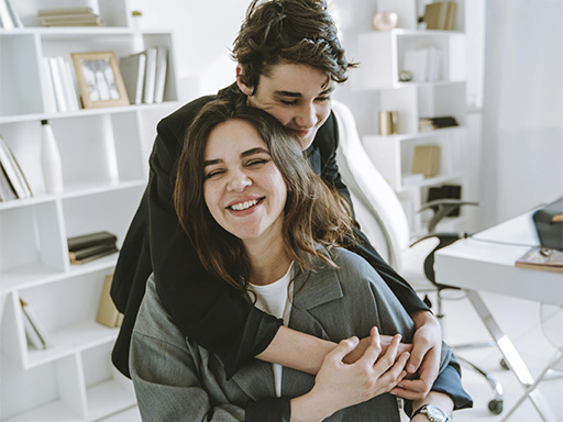 Teen son hugging her mother, represents how teen counseling in Deerfield, Il can help parents better support their children.
