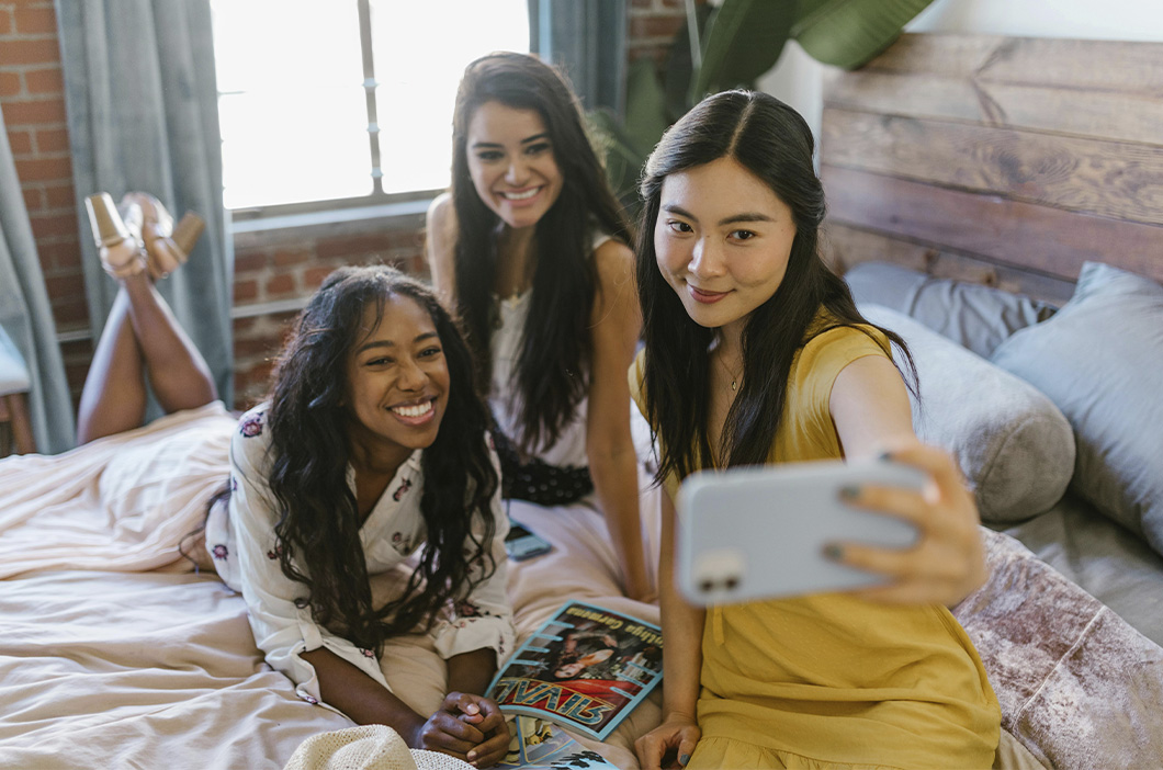 Group of teens taking a selfie, represents how parents can better better support teenager friendships and help them overcome their issues.